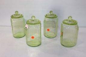 Four Green Depression Glass Canisters