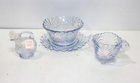 Four Pieces of Ice Blue Glass