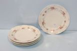 Four Hand Painted Dinner Plates