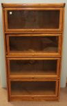 Oak One Piece Four Door Bookcase 