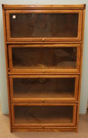 Oak One Piece Four Door Bookcase 