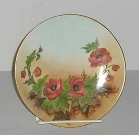 Small round hand painted RS Germany plate w/flowers