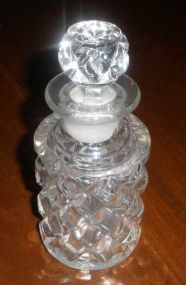 Round diamond cut perfume bottle