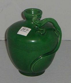 Green oriental vase with dragon