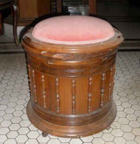 Pair of very unusual upholstered lift top walnut commodes with casters