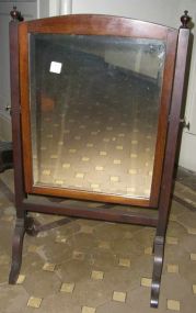 Mahogany framed small chevel petticoat beveled mirror