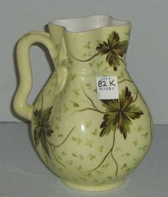 Hand painted pitcher, French crimped body, blue & green leaves