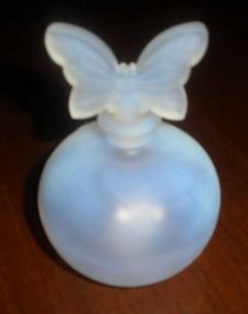 Frosted French perfume bottle with butterfly stopper