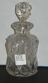 Clear perfume bottle with diamond shapes