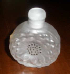 Lalique perfume bottle with frosted flower design