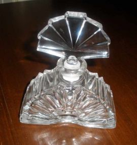 Clear fan shaped perfume bottle with fan shaped stopper