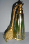 Green faded to clear perfume bottle with gold trim with spray