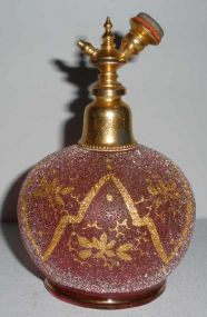 Cranberry crackled with gold trimmed flowers perfume bottle