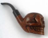 Carved Skull Pipe