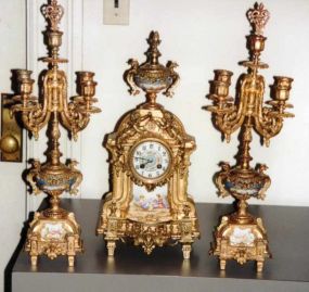 3 piece French Gilt Clock with Pair of 5 Light Candelabra with Porcelain Inserts