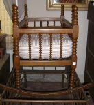 Oak Spool Baby Cradle on Rockers