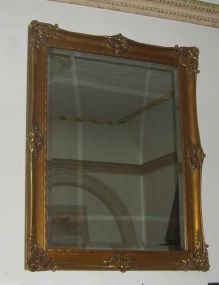 Large gilded gold framed beveled mirror