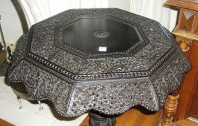 Oriental ebonized very ornately carved & decorated center table