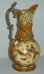 Large Majolica pitcher with flowers & open carved top