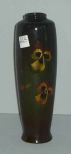 Black vase with glazed over white & brown flowers