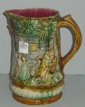 Majolica pitcher with peasants & musicians