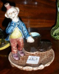 Majolica clown match holder with boot