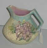 Small Majolica pitcher with purple flowers