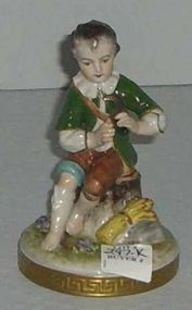 Small boy figure with knife