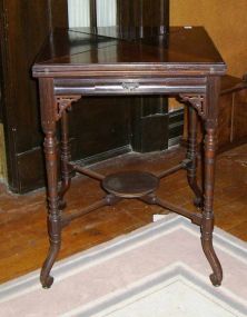 Rosewood handkerchief folding game table with rotating top & one drawer