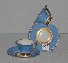 A Pair of Handmalat Hackefors Sweden Cup and Saucer