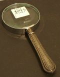 Small magnifying glass with silverplate handle