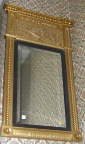 Gilt and Ebonized Framed Beveled Mirror