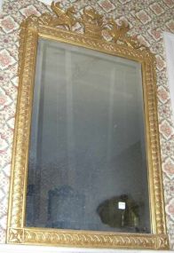 Gilt framed XVIII century classic design beveled mirror