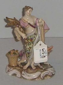Figural Lady Holding Wheat