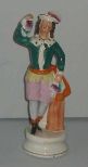 Reproduction Staffordshire Grape Seller Figurine