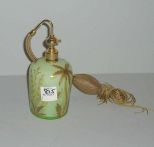 Light green & gold perfume bottle with trees