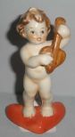 Small Hummel Cherub on Heart Shaped Base