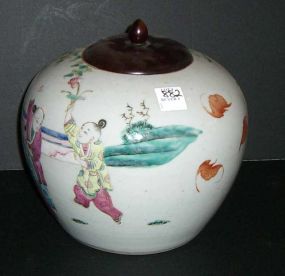 Oriental temple jar with wooden lid