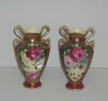 Nippon pair of double handled vases with raised gold & roses