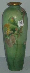 Hand decorated vase, green background w/birds and floral decoration