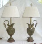 Pair of large ewer shaped bronze reposse table lamps