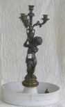 Bronze cherub candelabra with pottery bowl base