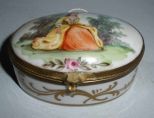 Large Oval Covered Hinged Box with Scene of Lady on Wall