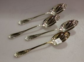 Set of Four Rocaille Sterling Silver Spoons by Erquis