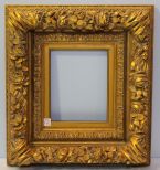 Heavily Carved Gold Leaf Frame