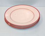 Four White and Red Dinner Plates