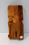 Man with Pipe Carved Wall Plaque