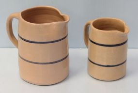 Two Crock Pitchers with Blue Stripes