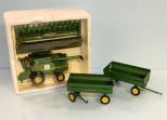 John Deere 9760 Tractor Combine with two wagons