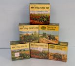 Six small John Deere puzzles